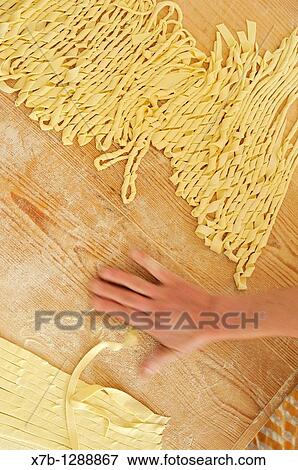 Specchia Gallone LE Puglia Italy Sagne? ncannulate, handmade pasta typical of the region View Large Photo Image Stock Photo - Specchia Gallone LE Puglia Italy Sagne? ncannulate, handmade pasta typical of the region. Fotosearch
