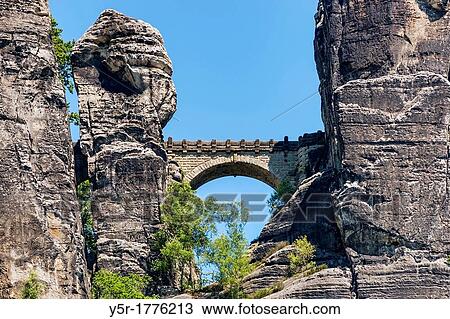 Spectacular rock formation Bastei Bastion and Bastei Bridge It is one of the most visited tourist attractions in the Saxon Switzerland, municipality Lohmen, Saxony, Germany, Europe View Large Photo Image Stock Image - Spectacular rock formation Bastei Bastion and Bastei Bridge It is one of the most visited tourist attractions in the Saxon Switzerland, municipality Lohmen, Saxony, Germany, Europe. Fotosearch