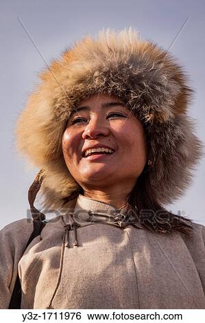 Spectator, Bactrian camel race, 25km across winter landscape of Gobi desert during Bulgan's? festival of a thousand camels?, Mongolia View Large Photo Image Stock Photograph - Spectator, Bactrian camel race, 25km across winter landscape of Gobi desert during Bulgan's? festival of a thousand camels?, Mongolia. Fotosearch