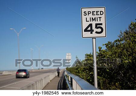 Stock Photography - Speed limit sign on bridge at Vero Beach, Florida, USA.. Fotosearch