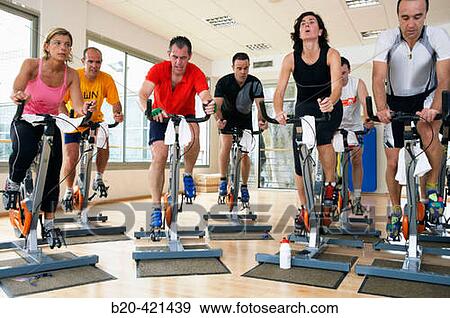 Stock Photo - Spinning, training program for cardiovascular work and toning up in exercise bicycle. Real Club de Tenis de San SebastiBn, Gipuzkoa, Euskadi.. Fotosearch