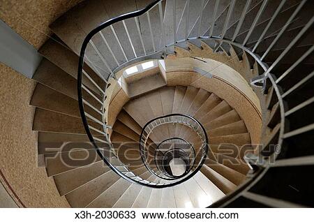 Stock Image - spiral staircase of the main lighthouse of Goulenez, Ile de Sein, off the coast of Pointe du Raz, Finistere department, Brittany region, west of France, western Europe. 1015. Fotosearch