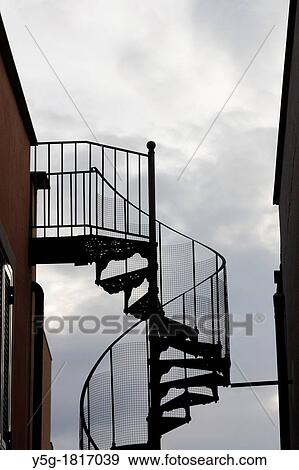 spiral staircase outdoors by property View Large Photo Image Stock Photo - spiral staircase outdoors by property. Fotosearch