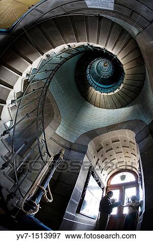Stock Photo - Spiral staircases inside the Lighthouse Echkm? ll Penmarch, Finisterre, Brittany, France, Europe. Fotosearch