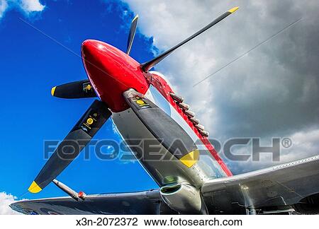 Spitfire Airplane showing bright, dramatic colors and deep blue cloudy sky. Easton Maryland USA View Large Photo Image Stock Image - Spitfire Airplane showing bright, dramatic colors and deep blue cloudy sky. Easton Maryland USA. Fotosearch