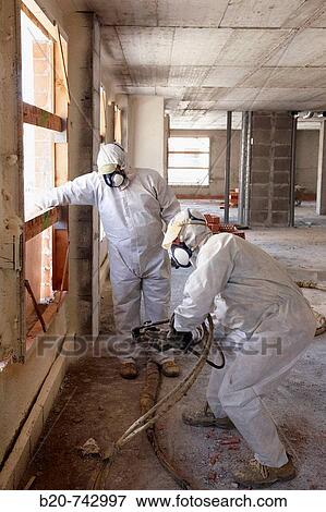 Spraying polyurethane foam, thermal and acoustic insulation, housing under construction. Donostia, Gipuzkoa, Basque Country, Spain View Large Photo Image Stock Photo - Spraying polyurethane foam, thermal and acoustic insulation, housing under construction. Donostia, Gipuzkoa, Basque Country, Spain. Fotosearch