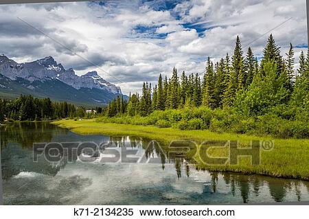 Spring Creek in Canmore, Alberta, Canada. View Large Photo Image Stock Photography - Spring Creek in Canmore, Alberta, Canada.. Fotosearch