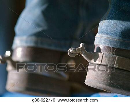 Spurs on cowboy boots in Tucson, Arizona View Large Photo Image Stock Photograph - Spurs on cowboy boots in Tucson, Arizona. Fotosearch