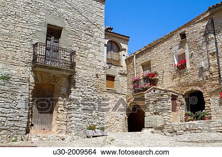 Picture - Square of Montfalc Murallat, a extremly small medieval and fortified village. Segarra. Lleida province. Spain.. Fotosearch