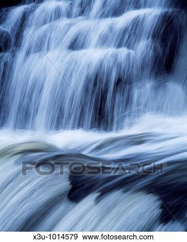 Sqwd Y Pannwr waterfall on the River Mellte near Pontneddfechan in the Brecon Beacons National Park, South Wales, United Kingdom View Large Photo Image Stock Photo - Sqwd Y Pannwr waterfall on the River Mellte near Pontneddfechan in the Brecon Beacons National Park, South Wales, United Kingdom. Fotosearch