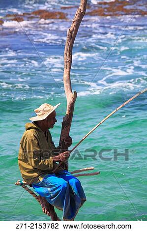 Sri Lanka, Ahangama, stilt fisherman,. View Large Photo Image Stock Image - Sri Lanka, Ahangama, stilt fisherman,.. Fotosearch