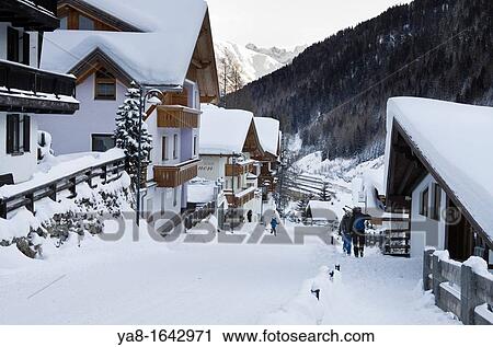 St Anton am Arlberg, Tirol, Austria, Europe Village street scene with skiers and traditional Austrian buildings after heavy snowfall in winter View Large Photo Image Stock Image - St Anton am Arlberg, Tirol, Austria, Europe Village street scene with skiers and traditional Austrian buildings after heavy snowfall in winter. Fotosearch