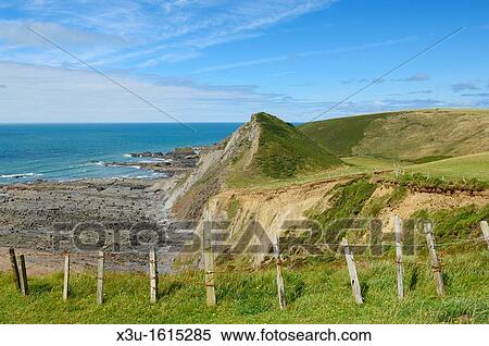 St Catherine's Tor at Spekes Mill Mouth near Hartland Quay on the North Devon Heritage Coast Devon, England, United Kingdom View Large Photo Image Stock Photography - St Catherine's Tor at Spekes Mill Mouth near Hartland Quay on the North Devon Heritage Coast Devon, England, United Kingdom. Fotosearch