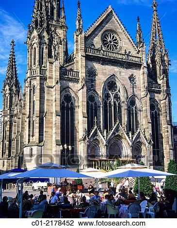 St Etienne protestant temple and caf? terrace Mulhouse Alsace France. View Large Photo Image Stock Image - St Etienne protestant temple and caf? terrace Mulhouse Alsace France.. Fotosearch