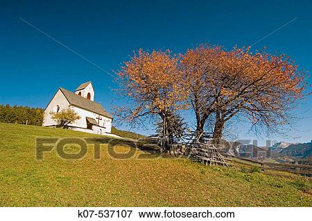 Stock Photo - St. Jacob church. Val di Funes. Trentino-Alto Adige, Bolzano province, Dolomites, Italy. Fotosearch