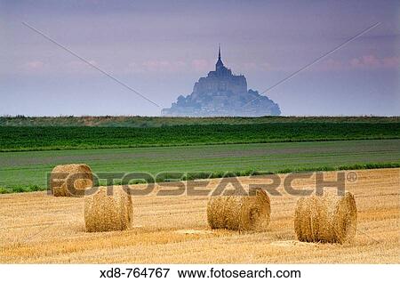 St Michael's Mount and farm land with wheat bales, Manche Department, Basse-Normandie region, Normandy, France, Europe View Large Photo Image Stock Photo - St Michael's Mount and farm land with wheat bales, Manche Department, Basse-Normandie region, Normandy, France, Europe. Fotosearch