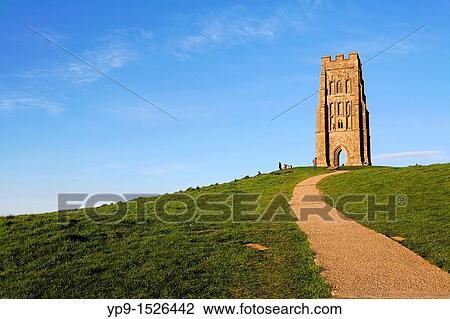 Stock Image - St Michael's tower on Glastonbury Tor, Glastonbury, Somerset, England. Fotosearch