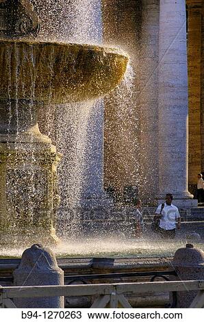 St. Peter's square and St. Peter's Basilica. Carlo Maderno's Fountain, 1612- 1614. Vatican city. Rome, Italy. View Large Photo Image Stock Image - St. Peter's square and St. Peter's Basilica. Carlo Maderno's Fountain, 1612- 1614. Vatican city. Rome, Italy.. Fotosearch