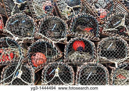 Stack of Lobster pots on Pier View Large Photo Image Picture - Stack of Lobster pots on Pier. Fotosearch