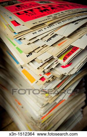 Stack of posters from printing press View Large Photo Image Picture - Stack of posters from printing press. Fotosearch
