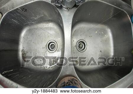 Stock Image - Stack to wash in a motorcycle shop. Fotosearch