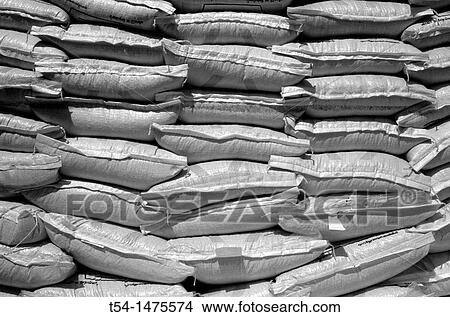 Stacked bags of rice View Large Photo Image Picture - Stacked bags of rice. Fotosearch