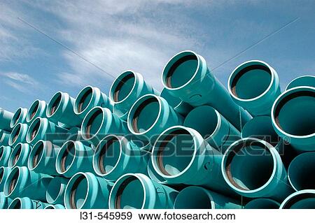 Stacked new gas pipe for utility burial to homes and business View Large Photo Image Stock Photo - Stacked new gas pipe for utility burial to homes and business. Fotosearch