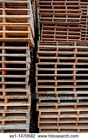 Stacked wooden pallets View Large Photo Image Stock Image - Stacked wooden pallets. Fotosearch