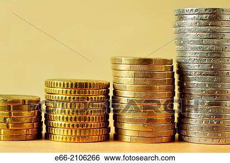 Stacks of euro coins against a light background. Coins are arranged by denomination, showing a upward trend. View Large Photo Image Stock Photograph - Stacks of euro coins against a light background. Coins are arranged by denomination, showing a upward trend.. Fotosearch