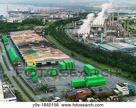 Stacks of green shipping containers at the Evergreen Shipping Terminal in Johor View Large Photo Image Stock Photograph - Stacks of green shipping containers at the Evergreen Shipping Terminal in Johor. Fotosearch