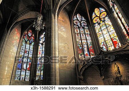 Stock Image - stained-glass window in the Cathedral Sainte-Marie, masterpiece by the master glazier Arnaud de Moles, Auch, Gers department, Midi-Pyrenees, southwest of France, Europe. Fotosearch