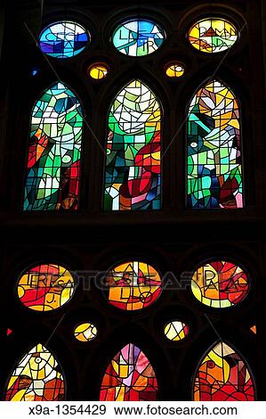 Stock Photo - Stained Glass Windows in the Sagrada Familia Church designed by Gaudi in Barcelona, Catalonia, Spain. Fotosearch