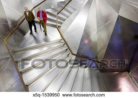 Stainless steel staircase in the entrace to Caixa Forum building, Madrid, Spain, work by Jacques Herzog and Pierre de Meuron View Large Photo Image Stock Image - Stainless steel staircase in the entrace to Caixa Forum building, Madrid, Spain, work by Jacques Herzog and Pierre de Meuron. Fotosearch