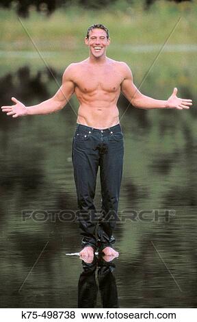 Standing on water View Large Photo Image Stock Photo - Standing on water. Fotosearch