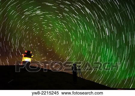 Star trails and lighthouse with Aurora Borealis or Northern Lights, Iceland. View Large Photo Image Stock Photography - Star trails and lighthouse with Aurora Borealis or Northern Lights, Iceland.. Fotosearch