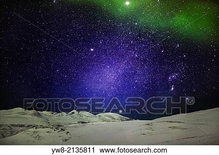 Starry evening with the Aurora Borealis or Northern Lights and the Milky Way Galaxy, Abisko, Lapland, Sweden. View Large Photo Image Stock Image - Starry evening with the Aurora Borealis or Northern Lights and the Milky Way Galaxy, Abisko, Lapland, Sweden.. Fotosearch