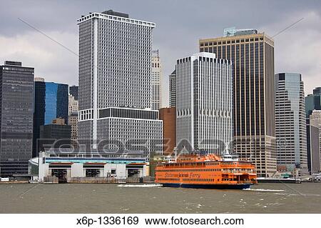 Staten Island Ferry approaching dock in lower Manhattan, New York City View Large Photo Image Stock Photo - Staten Island Ferry approaching dock in lower Manhattan, New York City. Fotosearch