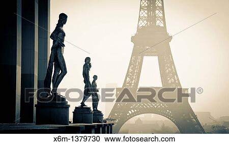 Stock Image - Statuary at the Palais de Chaillot and Eiffel Tower Paris, France. Fotosearch