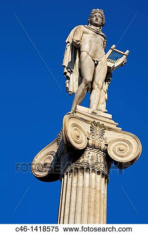 Stock Photography - Statue of Apollo on the Academy building Athens Greece. Fotosearch