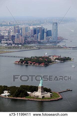 Stock Image - Statue of Liberty aerial view, Manhattan, New York, USA. Fotosearch