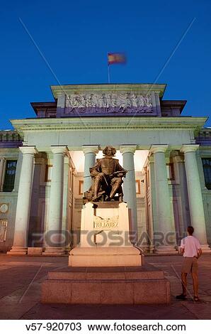 Statue of Velazquez and a man looking at the main facade at night. The Prado Museum, Madrid, Spain. View Large Photo Image Stock Image - Statue of Velazquez and a man looking at the main facade at night. The Prado Museum, Madrid, Spain.. Fotosearch