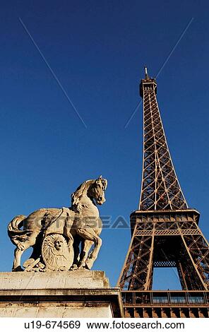 Stock Photo - Statue on Pont de l? Alma with Eiffel Tower in background, Paris, France. Fotosearch