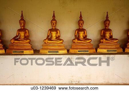 Statues in a buddhist temple in the city of Savannaket, Laos, Asia View Large Photo Image Stock Photo - Statues in a buddhist temple in the city of Savannaket, Laos, Asia. Fotosearch