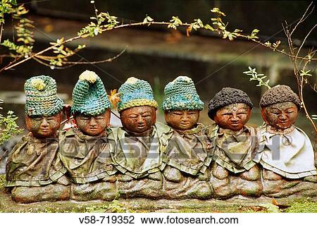Statues of jizo. Patron saint of dead children. Hase-dera temple. Kamakura. Japan View Large Photo Image Stock Image - Statues of jizo. Patron saint of dead children. Hase-dera temple. Kamakura. Japan. Fotosearch