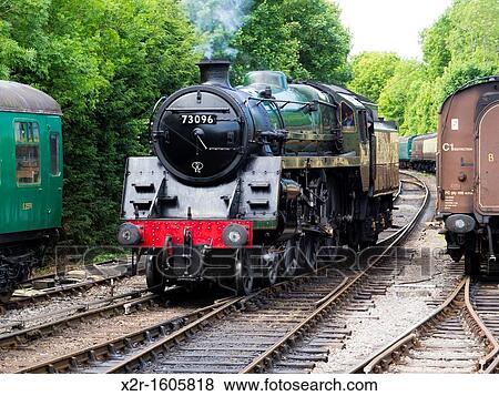 Steam engine 73096 on the Mid Hants Railway the Watercress Line at Alresford Station, Hampshire, England View Large Photo Image Stock Photo - Steam engine 73096 on the Mid Hants Railway the Watercress Line at Alresford Station, Hampshire, England. Fotosearch