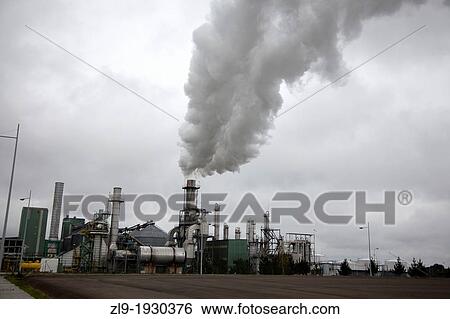 Stock Photograph - Steam rising from biomass factory, Leon, Spain. Fotosearch