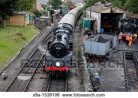 Steam Train entering Swanage, Dorset, England, UK View Large Photo Image Stock Photograph - Steam Train entering Swanage, Dorset, England, UK. Fotosearch