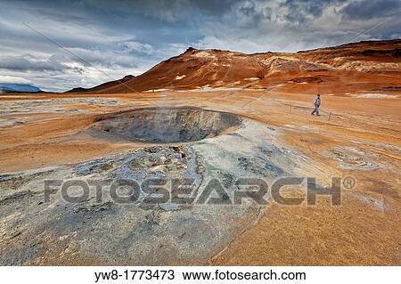 Stock Image - Steaming fumaroles at Namaskard geothermal area, Iceland Namaskard is an area of geothermal activity underground in the earth, with sulphur pools, steam vents and mud pools. Fotosearch