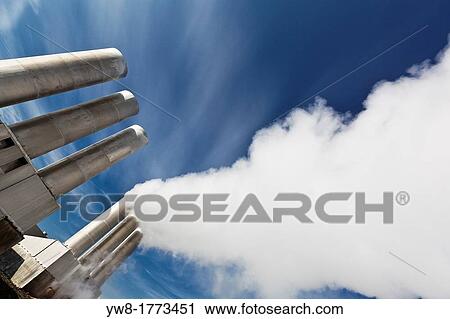 Stock Image - Steaming pipes at Gunnhver Reykjanes Geothermal Power Plant, Iceland. Fotosearch