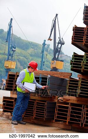 Stock Image - Steel Girders, Siderurgical products, Pasajes Port, Gipuzkoa, Basque Country, Spain.. Fotosearch